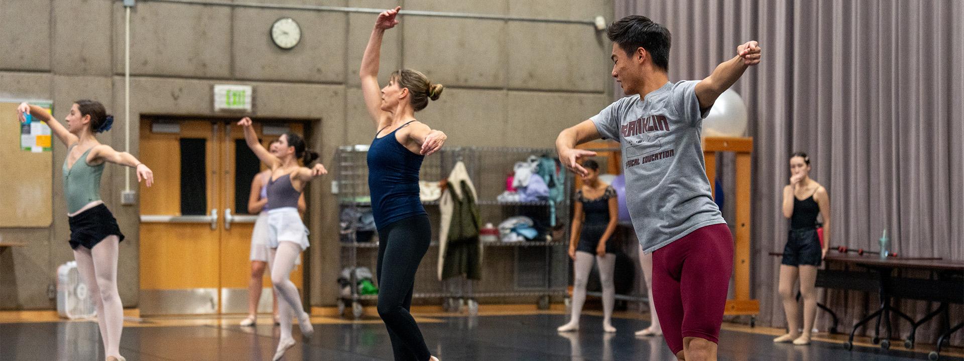 A group UO students rehearsing ballet in a dance studio 