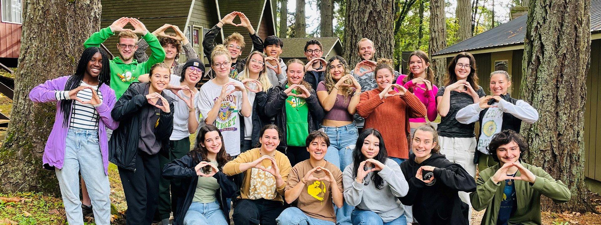 STAMPS scholar fall retreat group photo holding O up with hands