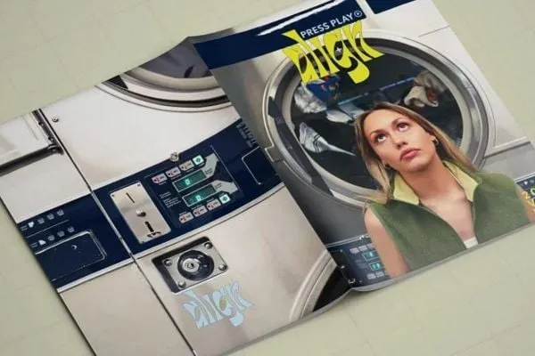Align magazine opened laying with front and back cover showing