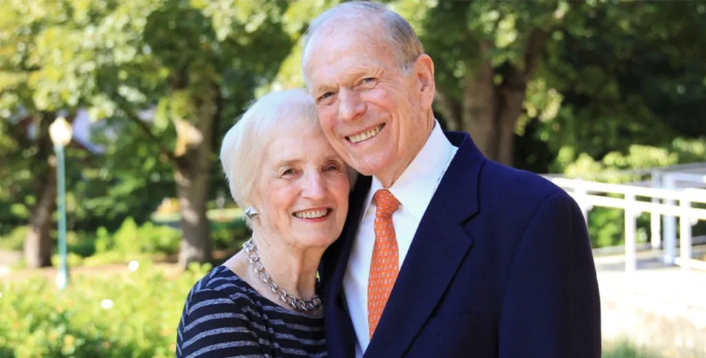 A photo of Andrew and Phyllis Berwick standing together, smiling