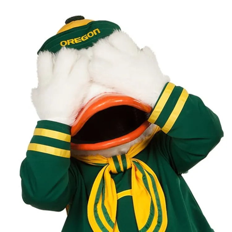 Duck mascot covering its eyes
