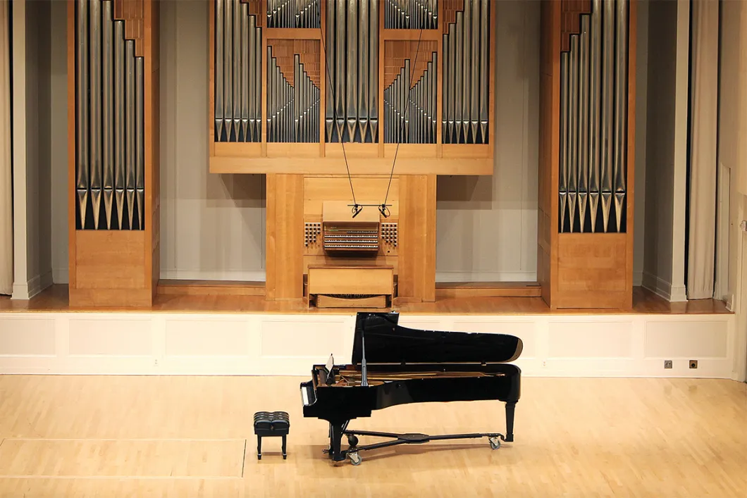 The Giustina Piano on the center of the stage at Beall hall
