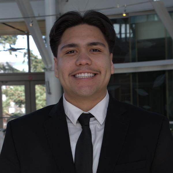 Student in a suit and tie