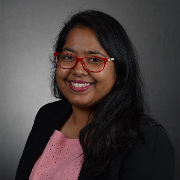 Student smiling in headshot