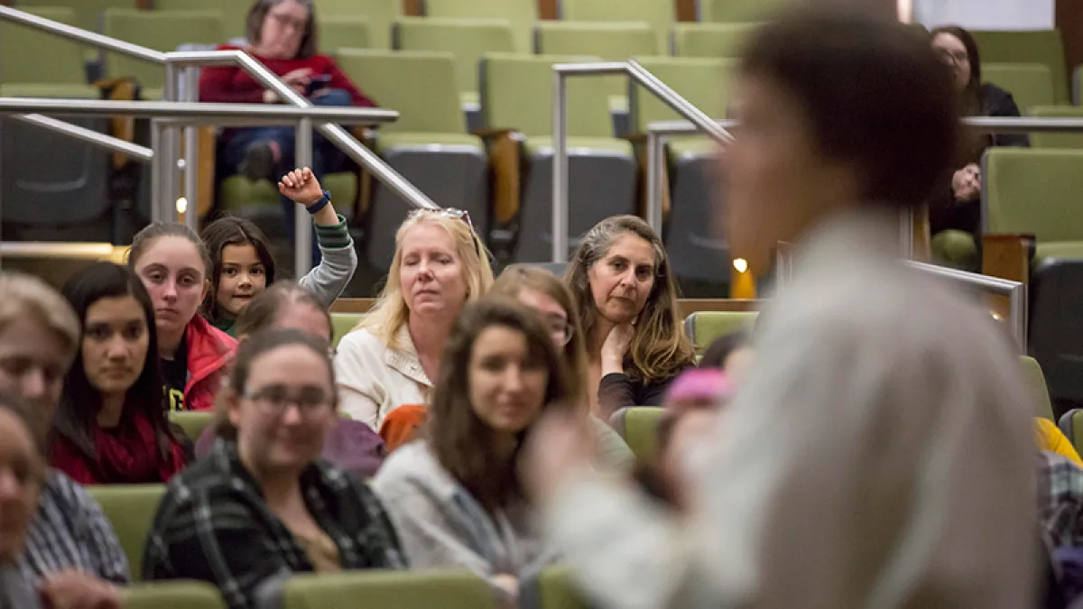 Ten female students in a University of Oregon lecture hall