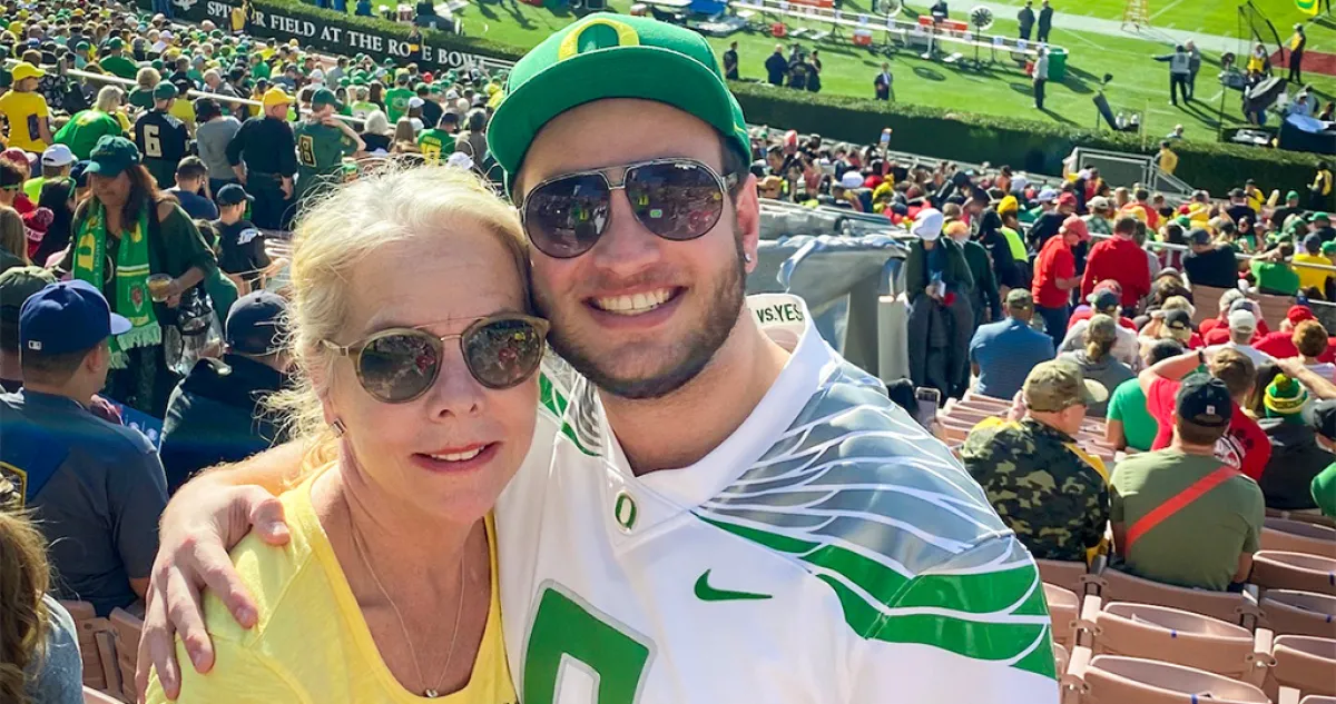 Jamie Carr and her son Tyler at a Ducks Football game