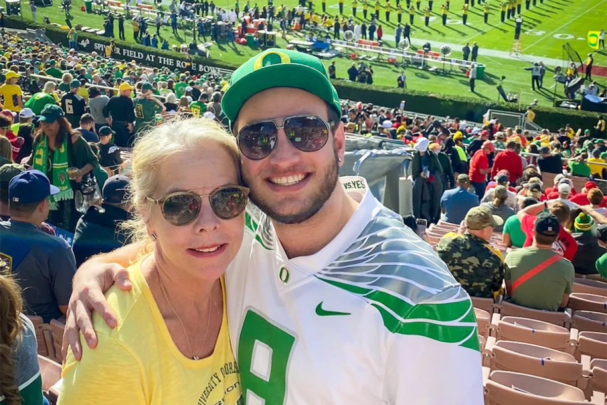 Jamie and Tyler Carr at a Ducks football game. 