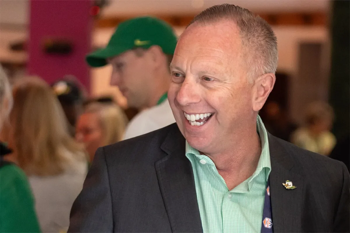 Rob Mullens smiling at an event