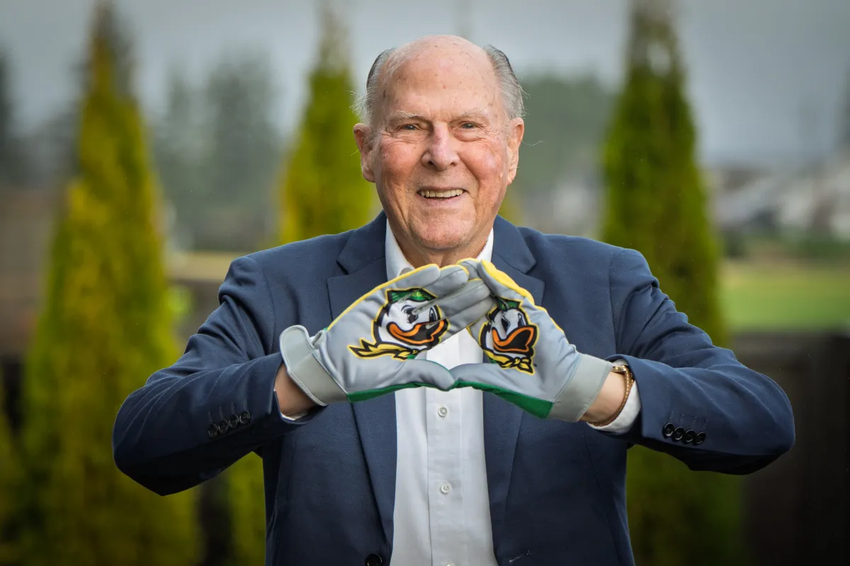 Alan Eliason makes an O sign with his gloved hands