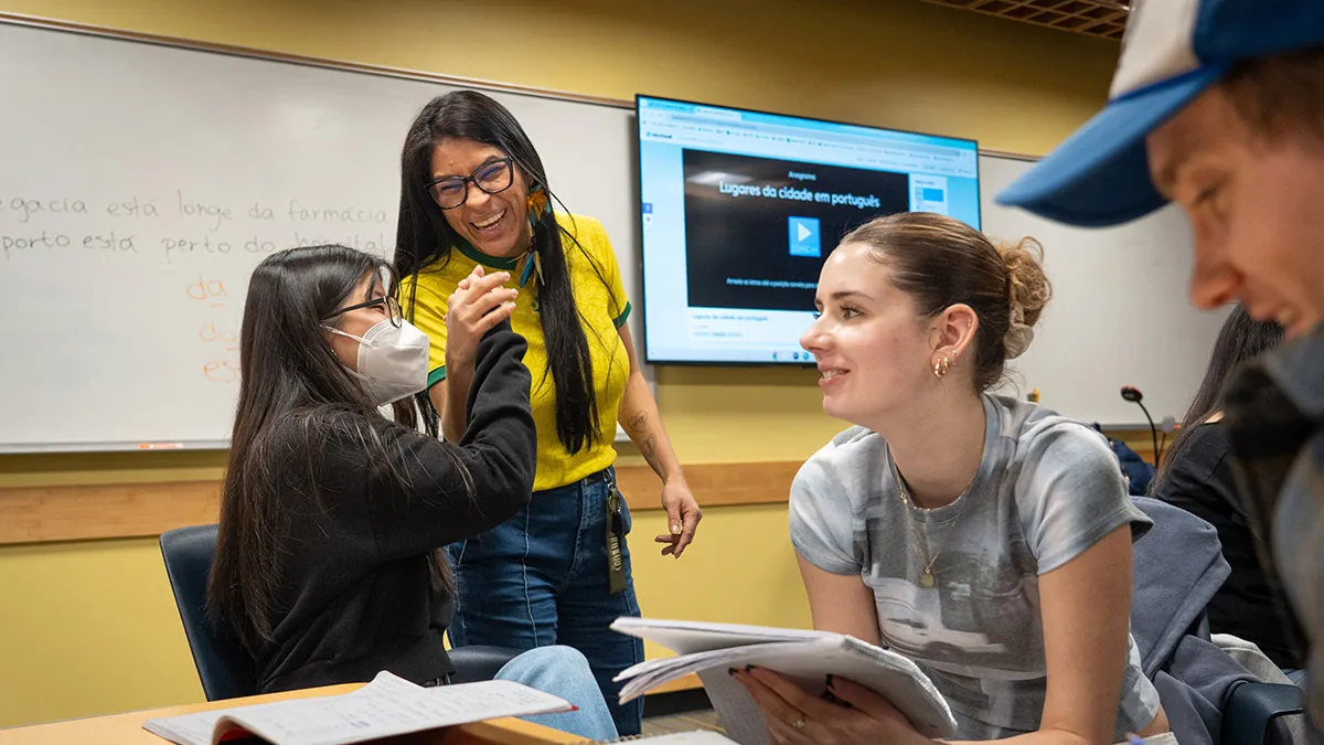 Janet Hughes interacting with students.
