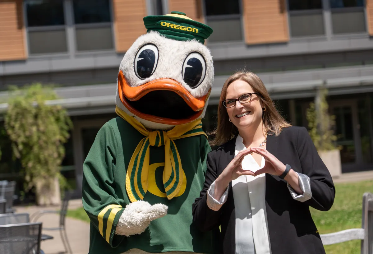 Duck posing with woman